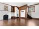 Living room featuring hardwood floors, fireplace and decorative wood trim at 112 S Rosemary Ave., Andrews, SC 29510