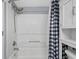 Clean bathroom featuring a shower with new shower head and a new shower curtain at 1207 Ocean Blvd. S # 50801, Myrtle Beach, SC 29577