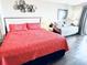 Bright bedroom featuring a cozy coral bed and an additional daybed for flexible sleeping arrangements at 1207 S Ocean Blvd. # 51104, Myrtle Beach, SC 29577