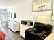 Bright kitchen featuring an electric stove, microwave, and dining area, perfect for everyday meals at 1207 S Ocean Blvd. # 51104, Myrtle Beach, SC 29577