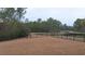 Large fenced backyard with pond view and mature trees offering privacy at 1330 Reflection Pond Dr., Little River, SC 29566