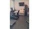 Well-equipped home gym with modern exercise machines for a complete workout experience in the comfort of your own home at 1330 Reflection Pond Dr., Little River, SC 29566