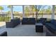 Inviting outdoor patio with wicker furniture, offering a relaxing space for residents and guests to enjoy the view at 1330 Reflection Pond Dr., Little River, SC 29566