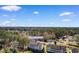 Aerial view showing 1440 Blue Tree Court nestled in a wooded community at 1440 Blue Tree Ct. # N, Myrtle Beach, SC 29588