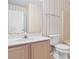 Bathroom featuring a single vanity, mirror, toilet and tub/shower combo at 1440 Blue Tree Ct. # N, Myrtle Beach, SC 29588