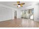 Spacious bedroom with laminate flooring, ceiling fan, closet and sliding glass doors to the sunroom at 1440 Blue Tree Ct. # N, Myrtle Beach, SC 29588