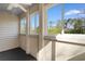 Sunroom featuring multiple windows offering views of the surrounding trees and blue skies at 1440 Blue Tree Ct. # N, Myrtle Beach, SC 29588