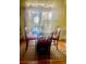 Breakfast nook with round table, four chairs, and bright natural light at 1575 Berkshire Ave., Myrtle Beach, SC 29577