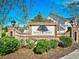 Emmens Preserve sign beautifully landscaped and framed by brick pillars, with a glimpse of a home behind it at 1575 Berkshire Ave., Myrtle Beach, SC 29577
