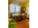Charming dining room with a round table, wood chairs, and a large window at 1575 Berkshire Ave., Myrtle Beach, SC 29577