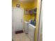 Bright laundry room with white washer and dryer and additional storage at 1575 Berkshire Ave., Myrtle Beach, SC 29577