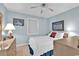 Cozy bedroom with neutral walls, ceiling fan, and dresser at 1582 S Waccamaw Dr. # 44, Murrells Inlet, SC 29576