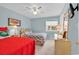 Charming bedroom features two twin beds, bright colors, and a coastal-themed decor at 1582 S Waccamaw Dr. # 44, Murrells Inlet, SC 29576