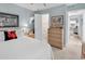Bedroom with furniture, neutral walls and an open doorway to en-suite bathroom at 1582 S Waccamaw Dr. # 44, Murrells Inlet, SC 29576