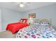 Bright bedroom with two beds, light blue walls, and beachy accents for a relaxing getaway at 1582 S Waccamaw Dr. # 44, Murrells Inlet, SC 29576