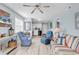 Open concept living space with access to kitchen and an abundance of light at 1582 S Waccamaw Dr. # 44, Murrells Inlet, SC 29576