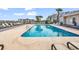 Community pool with lounge chairs offering a great place to relax and enjoy the sun at 1582 S Waccamaw Dr. # 44, Murrells Inlet, SC 29576