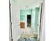 Bright bathroom with double sink vanity, walk-in shower, soaking tub, and access to a spacious walk-in closet at 1651 Fairforest Ct., Conway, SC 29526