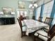 Open-concept dining room with elegant furnishings and views of an office space at 1651 Fairforest Ct., Conway, SC 29526