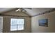 Cozy bedroom featuring a ceiling fan, window with blinds, and beach themed artwork at 182 Wimbledon Way # 182, Murrells Inlet, SC 29576