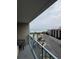 Balcony view overlooking pool, ocean, and parking area at 201 74Th Ave. N # 2549/2550, Myrtle Beach, SC 29577