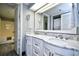 Updated bathroom with marble countertops and a view of the washer and dryer at 201 74Th Ave. N # 2549/2550, Myrtle Beach, SC 29577