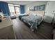 Comfortable bedroom featuring two beds, a desk, and a balcony with natural light at 201 74Th Ave. N # 2549/2550, Myrtle Beach, SC 29577