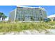Large multi-story building with ocean views from multiple balconies at 201 74Th Ave. N # 2549/2550, Myrtle Beach, SC 29577