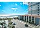 Stunning exterior view showcasing a beachfront condo and parking lot on a clear day at 201 74Th Ave. N # 2549/2550, Myrtle Beach, SC 29577