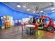 Spacious game room featuring various arcade machines and seating area at 201 74Th Ave. N # 2549/2550, Myrtle Beach, SC 29577