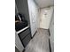 Hallway area with a coffee machine, microwave, mini fridge, and access to the main door at 201 74Th Ave. N # 2549/2550, Myrtle Beach, SC 29577