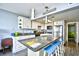 Kitchen with marble countertop island and modern light fixtures at 201 74Th Ave. N # 2549/2550, Myrtle Beach, SC 29577