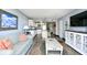 Open concept living room and kitchen with a tv and nice decor at 201 74Th Ave. N # 2549/2550, Myrtle Beach, SC 29577