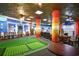 Fun dining area with a mini golf course and colorful design elements at 201 74Th Ave. N # 2549/2550, Myrtle Beach, SC 29577