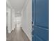 View from front door showcasing the hall with hard surface floors that leads into the home at 2020 Copper Creek Loop, Longs, SC 29568