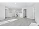 Spacious bonus room with carpeted floors, neutral paint, and ample natural light at 2044 Copper Creek Ct., Longs, SC 29568