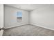 This is a bedroom with neutral walls and carpet, plus a window with blinds at 2052 Copper Creek Ct., Longs, SC 29568