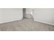 Hallway featuring neutral paint and carpet with views to stairs at 2052 Copper Creek Ct., Longs, SC 29568