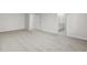 Spacious main bedroom with neutral carpeting and an ensuite bath at 2052 Copper Creek Ct., Longs, SC 29568