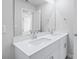 Sleek bathroom with a double sink vanity and a large mirror for a bright, open feel at 2104 Copper Creek Ct., Longs, SC 29568