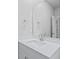 Bright bathroom featuring a modern vanity with white countertops and a large mirror at 2104 Copper Creek Ct., Longs, SC 29568