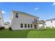 Exterior of home showcasing backyard and covered patio, great for outdoor enjoyment at 2104 Copper Creek Ct., Longs, SC 29568