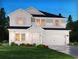 Charming two-story home with white siding, brick accents, and a well-manicured lawn at 2104 Copper Creek Ct., Longs, SC 29568