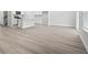 Inviting living room area with light wood flooring, modern finishes, and an open layout at 2104 Copper Creek Ct., Longs, SC 29568
