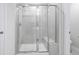 Modern bathroom shower with glass doors and a built-in bench for a luxurious experience at 2104 Copper Creek Ct., Longs, SC 29568