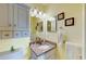 This bathroom features an elegant mirror and a granite countertop at 212 58Th Ave. N # 1C, North Myrtle Beach, SC 29582