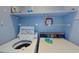 Functional laundry room with shelving, a clock, and well-maintained washer and dryer units for convenient chores at 212 58Th Ave. N # 1C, North Myrtle Beach, SC 29582
