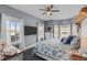Serene bedroom with a cozy bed, natural light, and tranquil decor at 2325 Highway 111, Little River, SC 29566