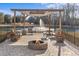 Outdoor firepit area includes a seating area, decorative lighting, and a water fountain view at 2325 Highway 111, Little River, SC 29566