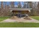 Covered storage area offering protection for recreational vehicles, boats or equipment, perfect for outdoor enthusiasts at 2325 Highway 111, Little River, SC 29566